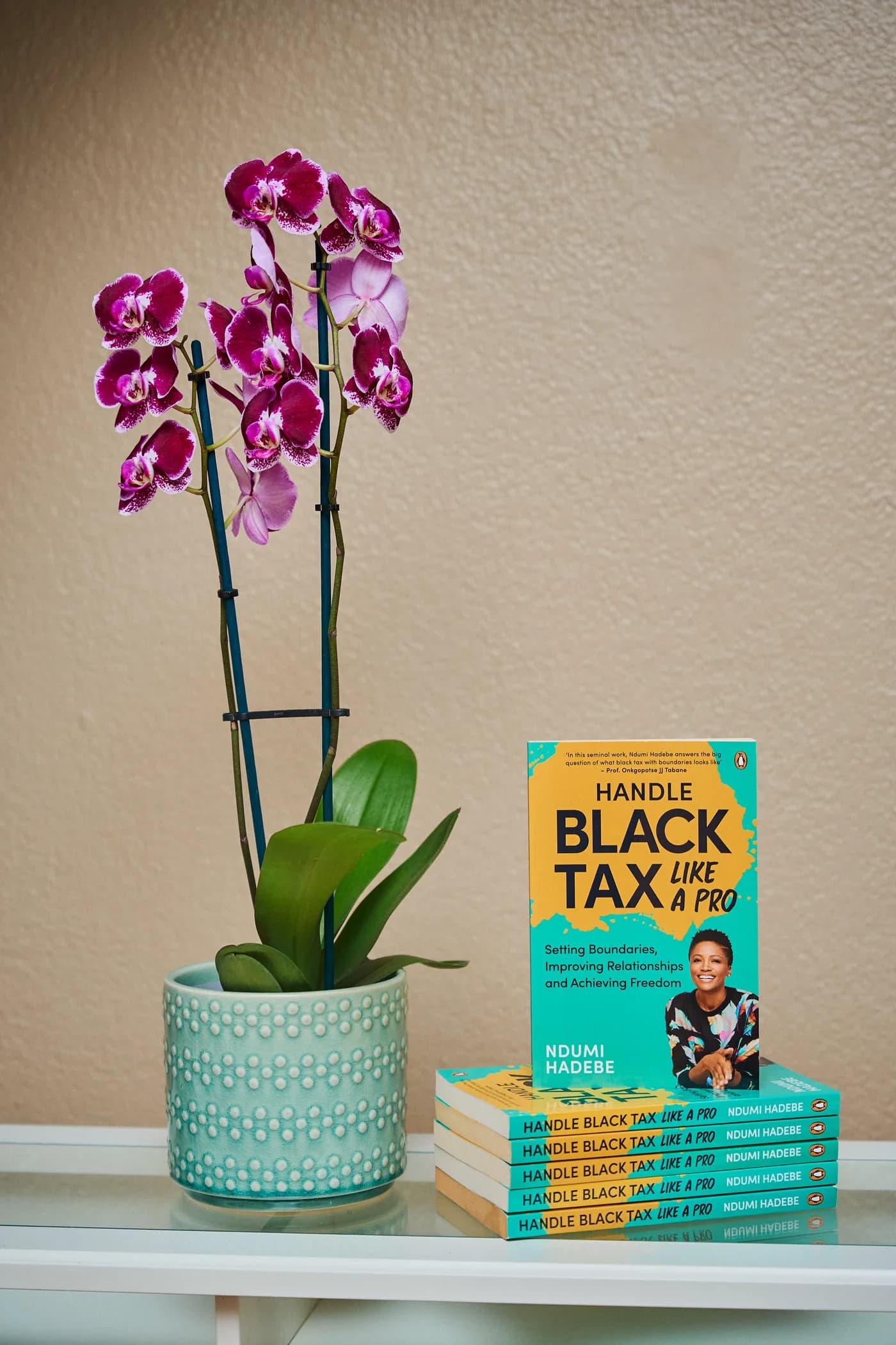 Handle Black Tax Like a Pro book with orchids